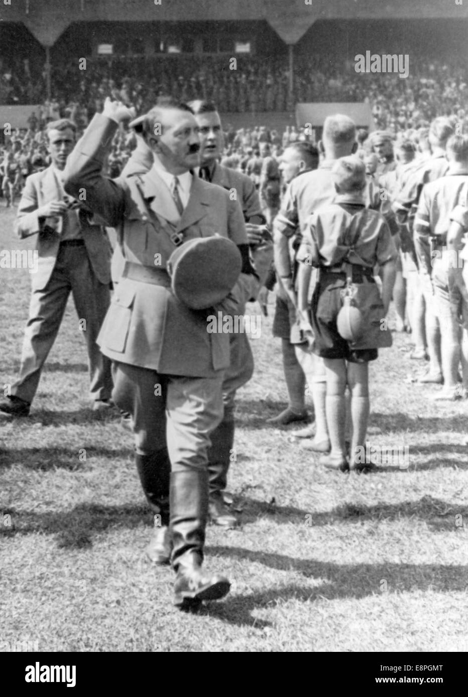 Nuremberg Rally 1934 in Nuremberg, Germany - Adolf Hitler (R) and head of the Hitler Youth (HJ) Baldur von Schirach inspect a line-up of members of the Hitler Youth at the Nazi party rally grounds. (Flaws in quality due to the historic picture copy) Fotoarchiv für Zeitgeschichtee - NO WIRE SERVICE - Stock Photo