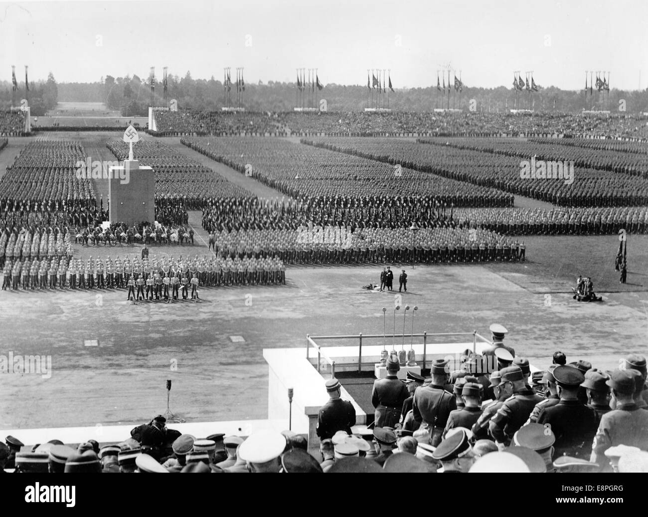 Nuremberg Rally 1936 in Nuremberg, Germany - Roll call of the Reich Labour Service (RAD) in front of the grandstand on Zeppelin Field at the Nazi party rally grounds. (Flaws in quality due to the historic picture copy) Fotoarchiv für Zeitgeschichtee - NO WIRE SERVICE - Stock Photo