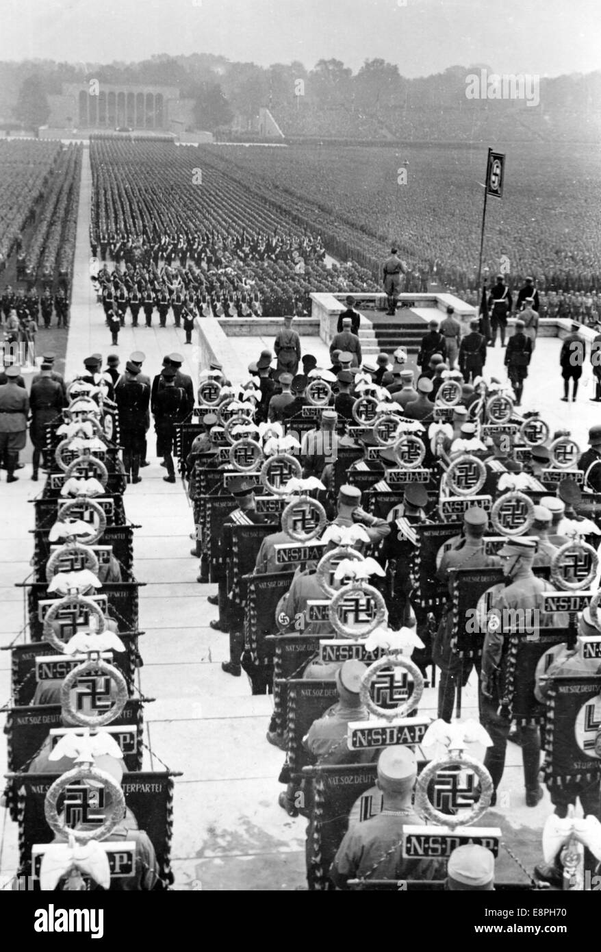 Nuremberg Rally 1937 in Nuremberg, Germany - Nazi party rally grounds - View of Luitpoldarena during a speech by Adolf Hitler to units of the Sturmtruppe (SA), Schutzstaffel (SS), National Socialist Motor Corps (NSKK) and National Socialist Flyers Corps (NSFK). In the background: the Hall of Honour. (Flaws in quality due to the historic picture copy) Fotoarchiv für Zeitgeschichtee - NO WIRE SERVICE - Stock Photo