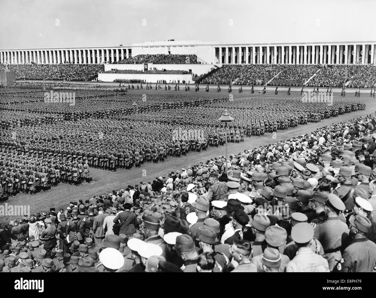Nuremberg Rally 1936 in Nuremberg, Germany - Roll call of the Reich labour Service (RAD) in front of the grandstand on Zeppelin Field at the Nazi party rally grounds. (Flaws in quality due to the historic picture copy) Fotoarchiv für Zeitgeschichtee - NO WIRE SERVICE - Stock Photo