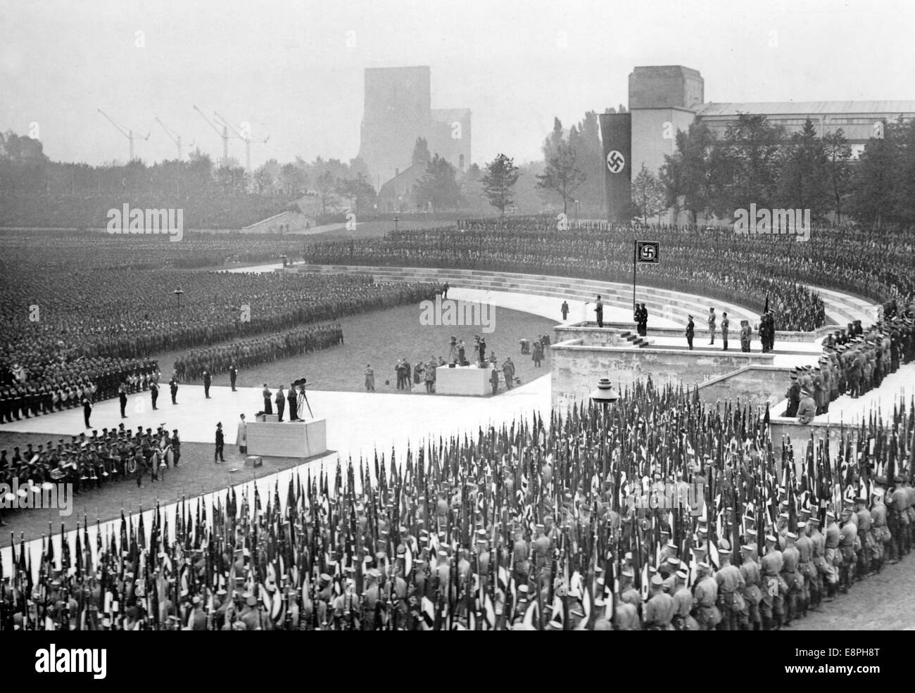 Nuremberg Rally 1937 in Nuremberg, Germany - Nazi party rally grounds - View of Luitpoldarena during a speech by Adolf Hitler (on the tribune) to units of the Sturmtruppe (SA), Schutzstaffel (SS), National Socialist Motor Corps (NSKK) and National Socialist Flyers Corps (NSFK). (Flaws in quality due to the historic picture copy) Fotoarchiv für Zeitgeschichtee - NO WIRE SERVICE - Stock Photo