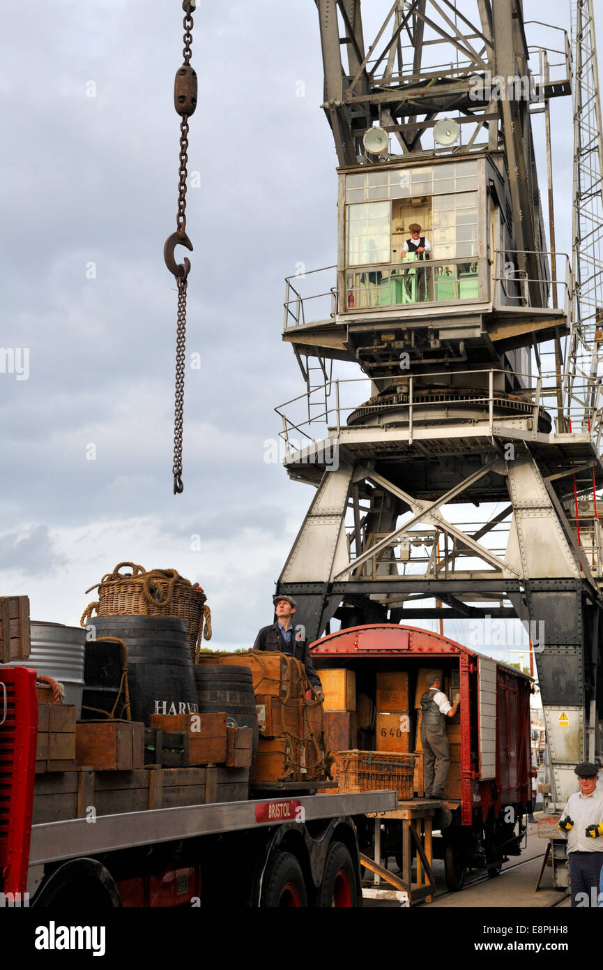 Re-enactment of 1950's cargo loading / unloading British Road Services lorry Bristol docks cargo cranes at M Shed Stock Photo