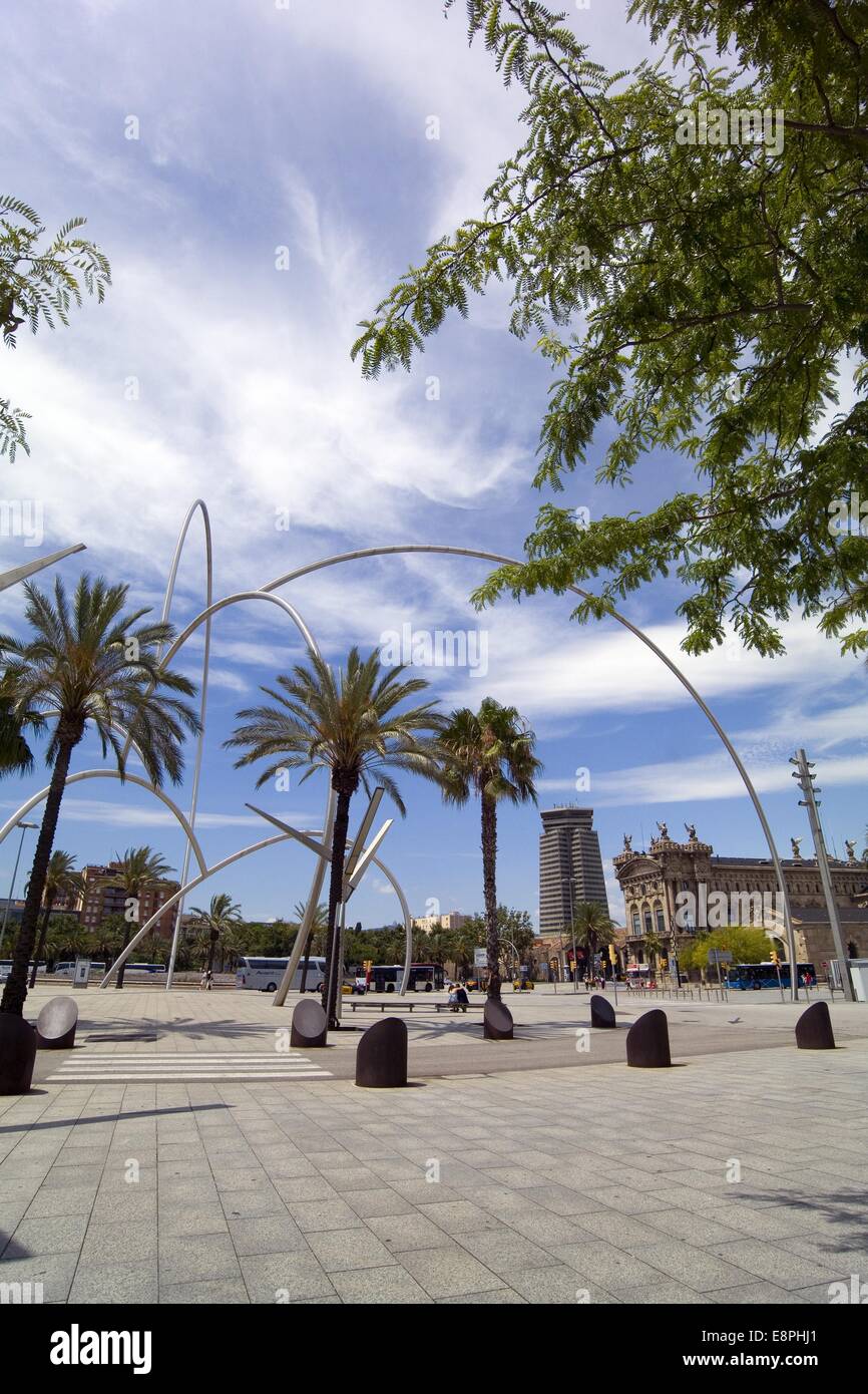Barcelona Port area with Onades -the waves stainless steel sculpture by Andreu Alfaro, the Columbus Tower and Old Customs House Stock Photo