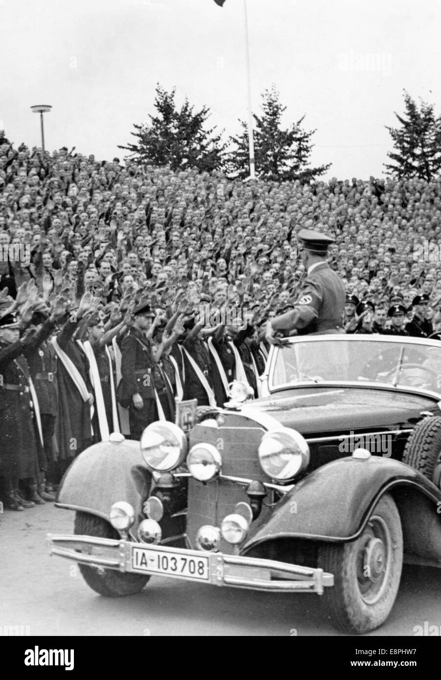 Nuremberg Rally 1937 in Nuremberg, Germany - Nazi party rally grounds - Adolf Hitler leaves the stadium of the Hitler Youth after the end of the roll call of the Hitler Youth (HJ). (Flaws in quality due to the historic picture copy) Fotoarchiv für Zeitgeschichtee - NO WIRE SERVICE - Stock Photo