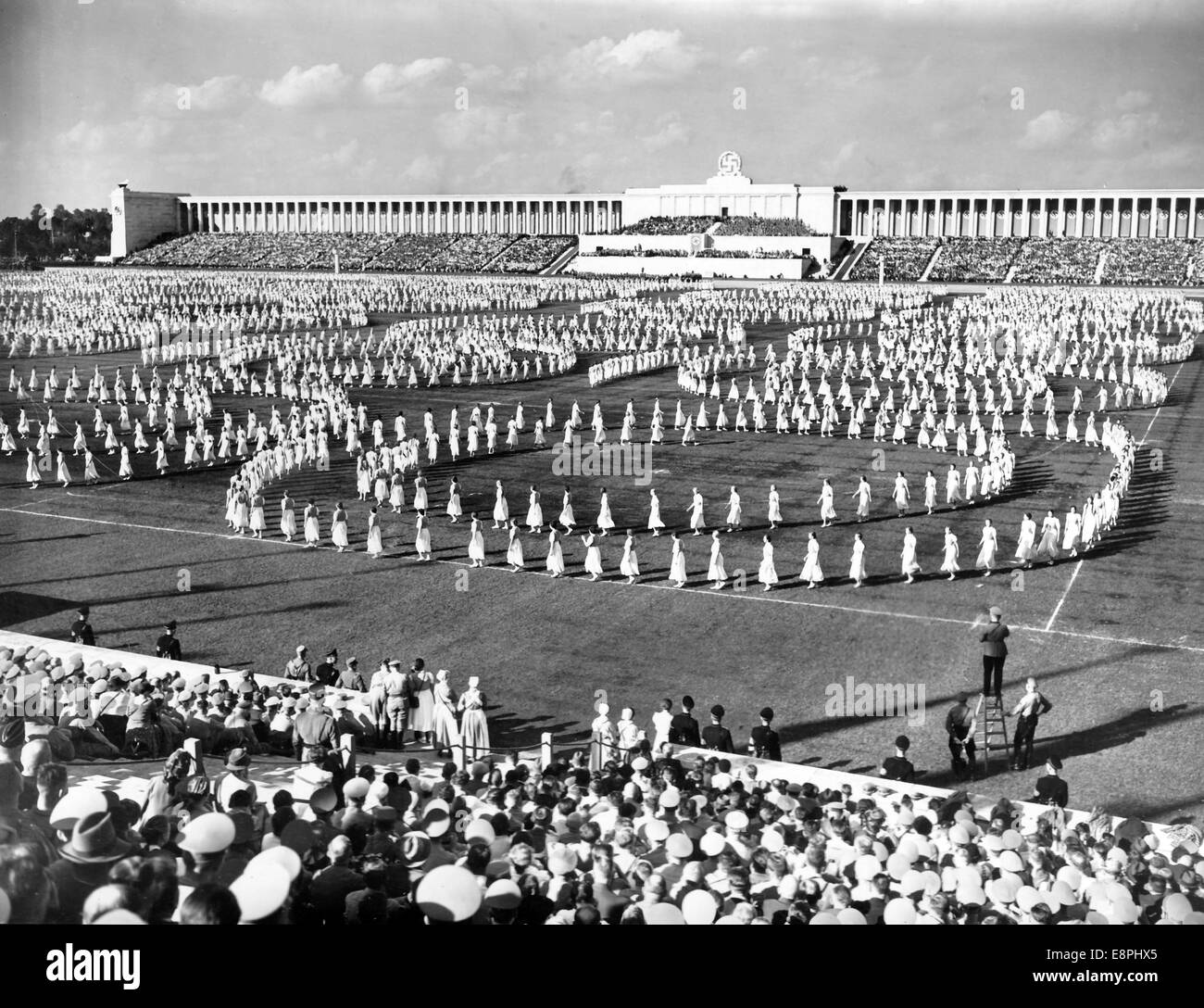 Nuremberg Rally in Nuremberg, Germany - Dance display on the 'Day of the Community' on Zeppelin Field at the Nazi party rally grounds, here 5,000 members of the League of German Girls (BDM) present folk dances, In the background the grandstand. (Flaws in quality due to the historic picture copy) Fotoarchiv für Zeitgeschichtee - NO WIRE SERVICE - Stock Photo