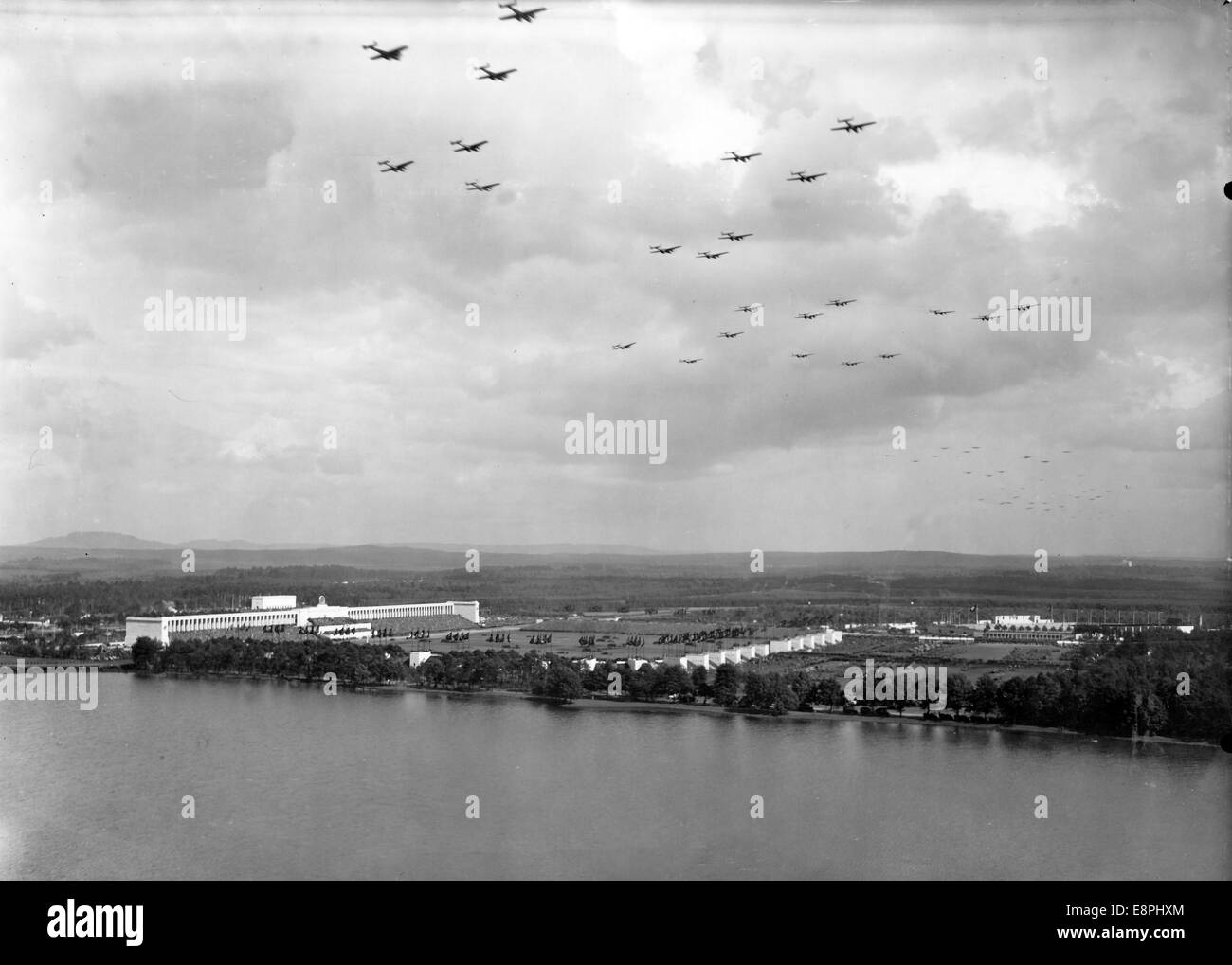 Nuremberg Rally 1938 in Nuremberg, Germany - Rehearsals of the German Wehrmacht (armed forces) prior to the demonstrations on 'Wehrmacht Day', here, air force wings fly over Zeppelin Field at the Nazi party rally grounds. On the right the 'stadium of the Hitler Youth'. (Flaws in quality due to the historic picture copy) Fotoarchiv für Zeitgeschichtee - NO WIRE SERVICE - Stock Photo