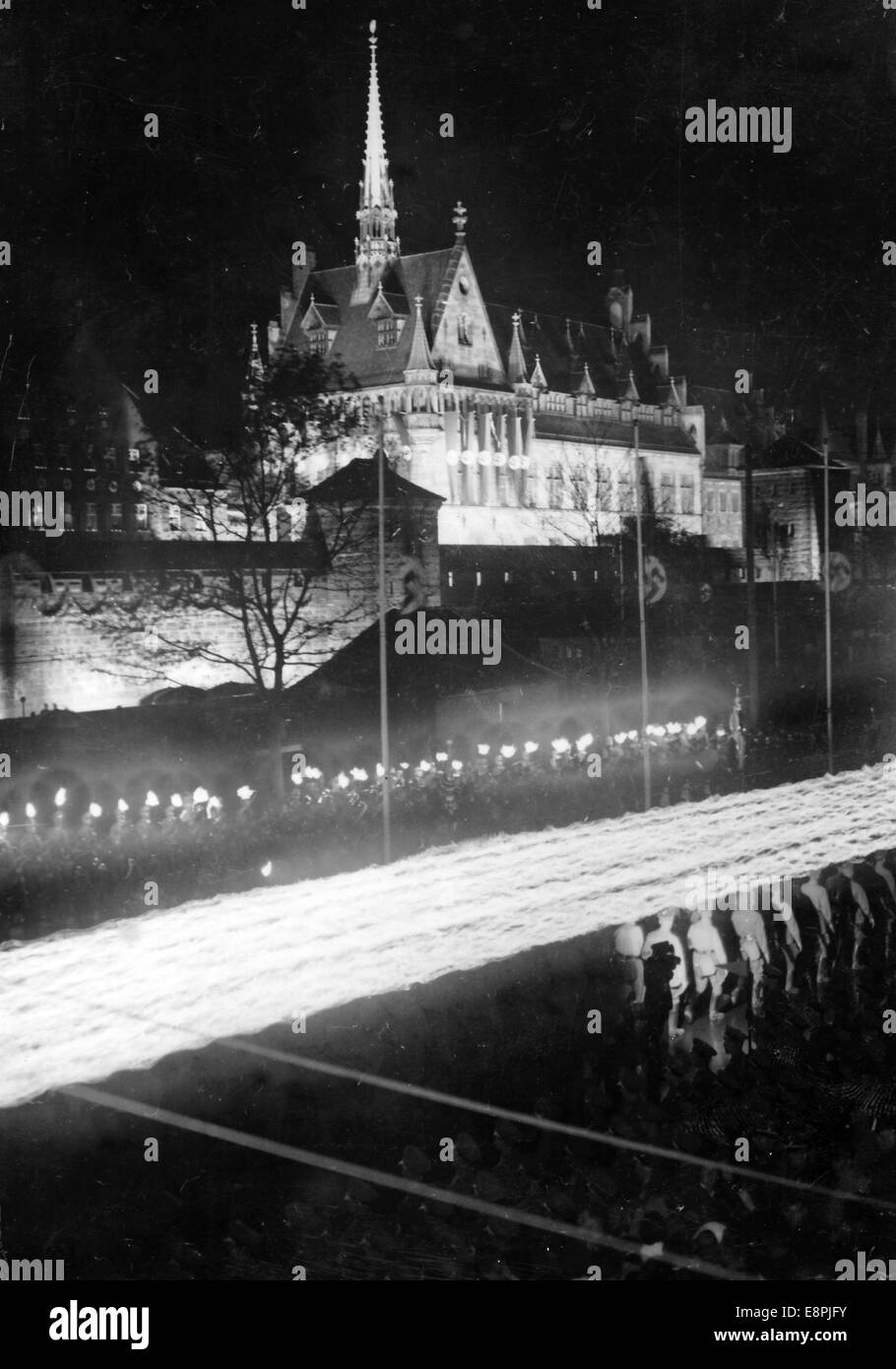 Nuremberg Rally 1937 in Nuremberg, Germany - March-past of the great torchlight procession of the political leaders in front of Adolf Hitler on the balcony of the Hotel 'Deutscher Hof'. Fotoarchiv für Zeitgeschichtee - NO WIRE SERVICE – Stock Photo