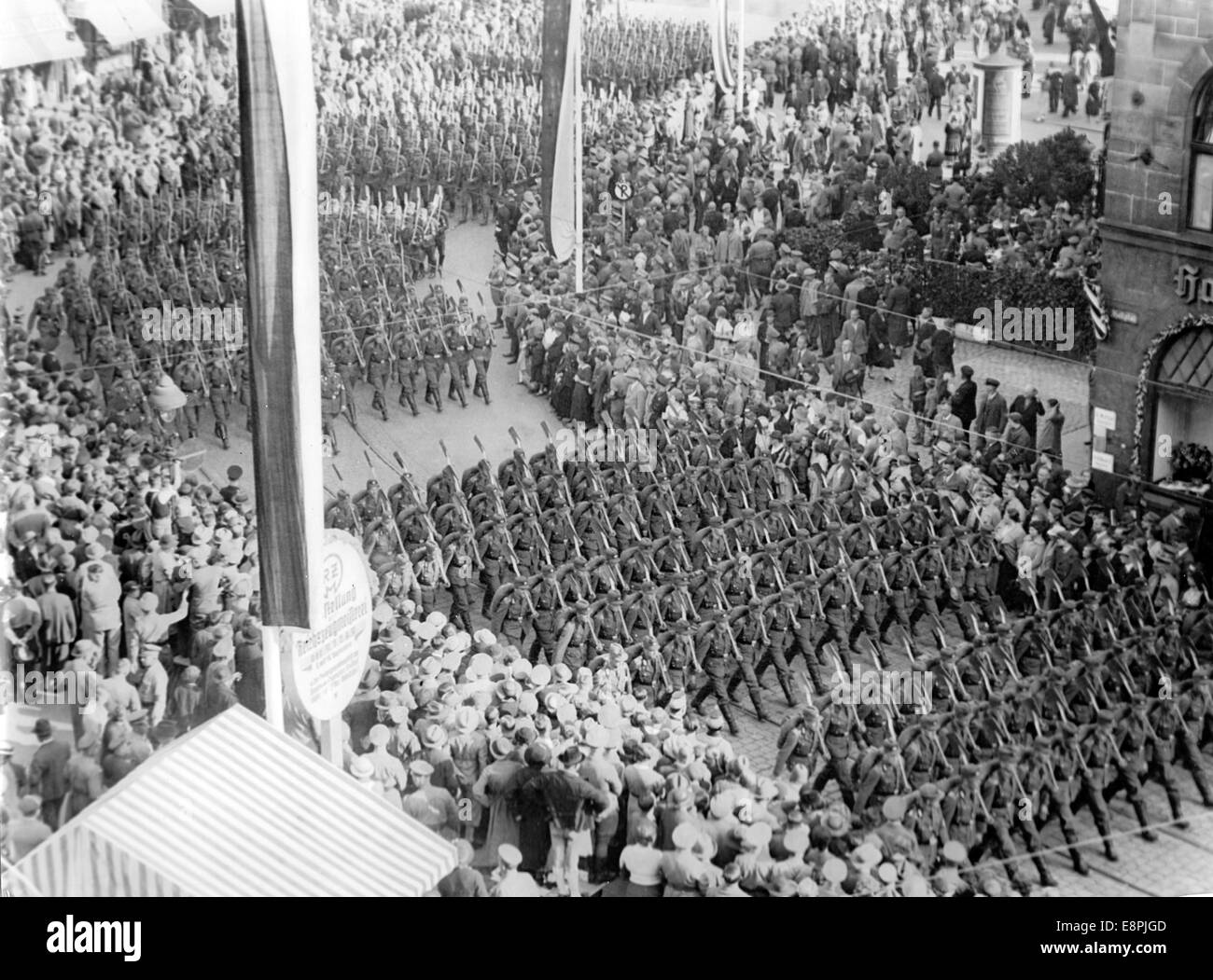 Nuremberg Rally 1937 in Nuremberg, Germany - Members of the Reich Labour Service (RAD) march through the streets of the city with rucksacks and spades. Fotoarchiv für Zeitgeschichtee - NO WIRE SERVICE - Stock Photo