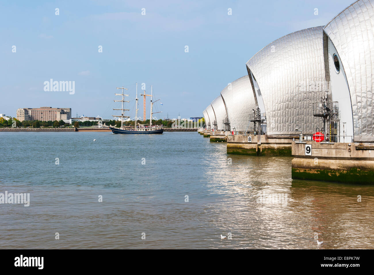 Thames Barrier, London and a Tall Ship taking part in the Tall Ships Regatta Stock Photo