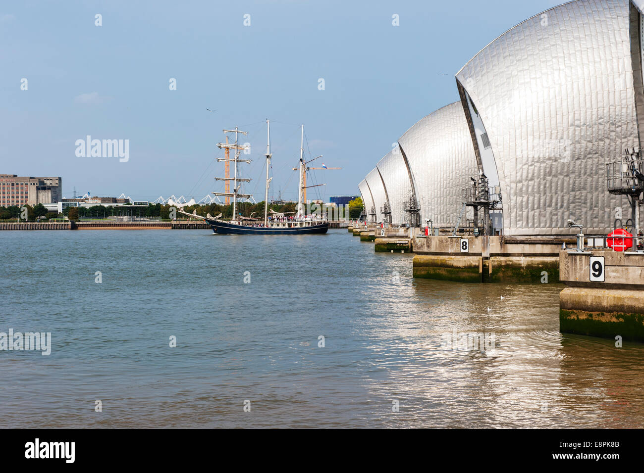 Thames Barrier, London and a Tall Ship taking part in the Tall Ships Regatta Stock Photo