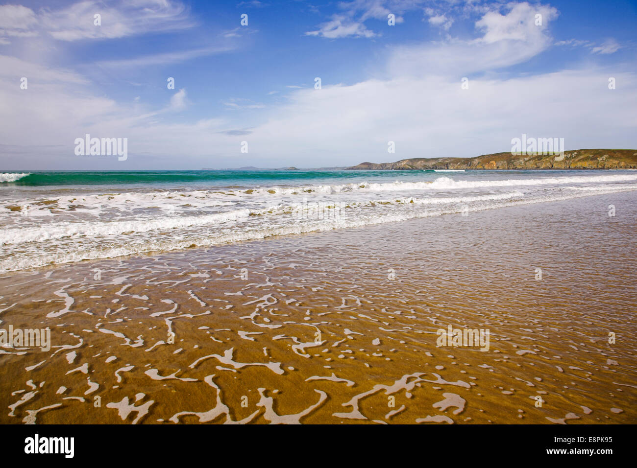 Shallow water on the foreshore of Newgale beach, Pembrokeshire. Stock Photo