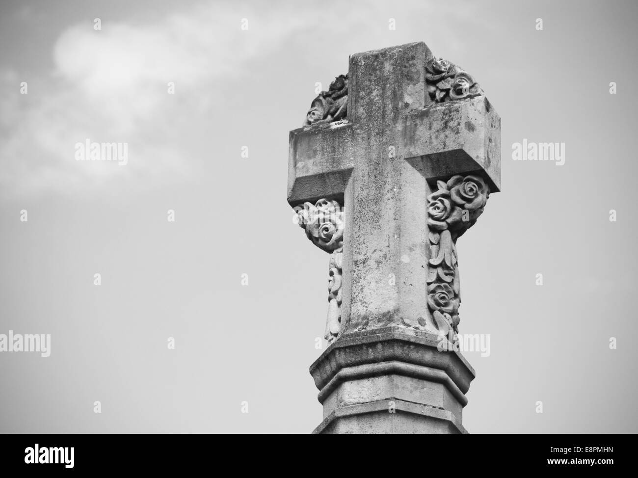 Detail of stone cross war memorial outside Winchester Cathedral, England - monochrome processing Stock Photo