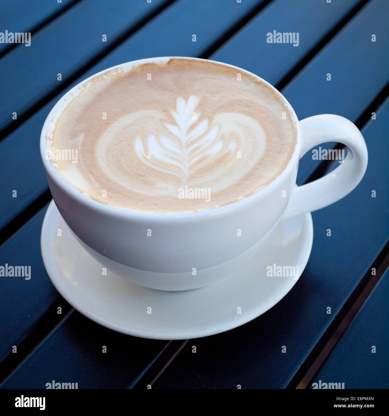 A classic caffè latte (latte art) from d'Lish by Tish Cafe in Saskatoon, Saskatchewan, Canada. Stock Photo