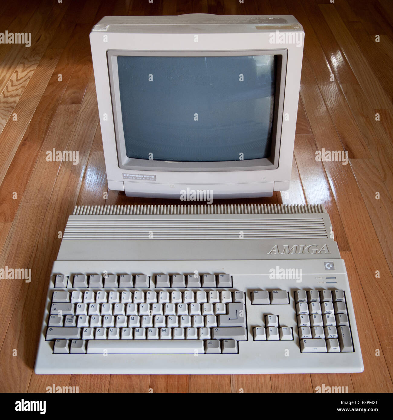 A view of a Commodore Amiga 500 computer and a Commodore 1084S computer monitor. Stock Photo