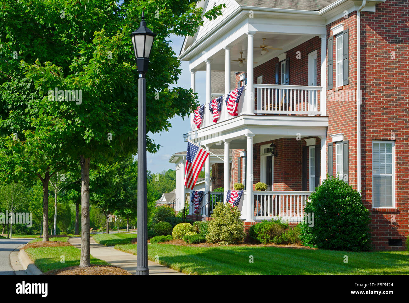 American flag front porch hi-res stock photography and images - Alamy