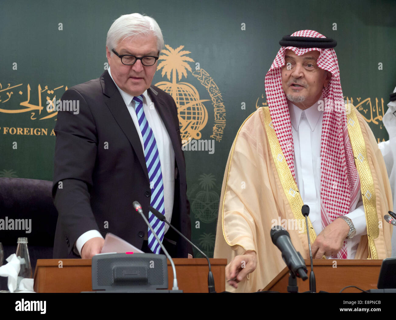 Jeddah, Saudi Arabia. 13th Oct, 2014. German Foreign Minister Frank-Walter Steinmeier (SPD, L) gives a press conference with the Saudi Foreign Minister, Saud al-Faisal, in Jeddah, Saudi Arabia, 13 October 2014. Steinmeier is on a two-day trip to the country. PHOTO: TIM BRAKEMEIER/dpa/Alamy Live News Stock Photo