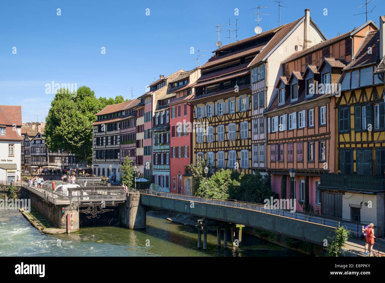 Petite France old town, Strasbourg, France - Old buildings and tourist on the Grande Ile Stock Photo