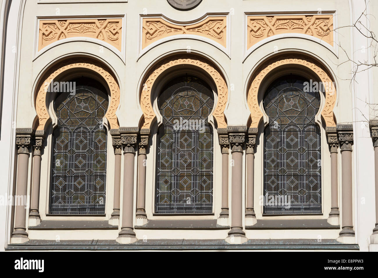 The exterior of the Moorish style of the Spanish synagogue with windows in the City of Prague, Czech Republic. Stock Photo