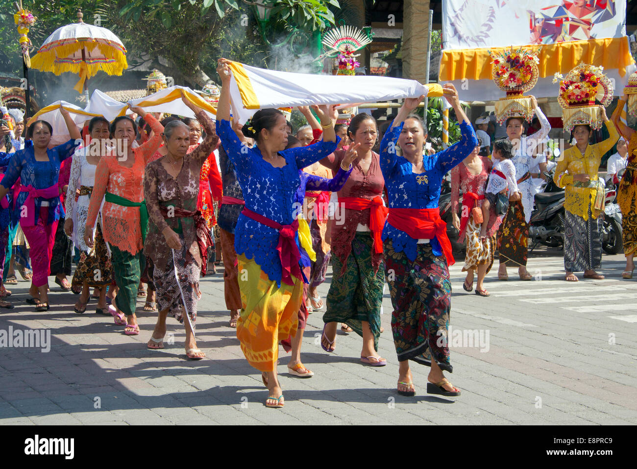 Balinese women in traditional costume hires stock photography and