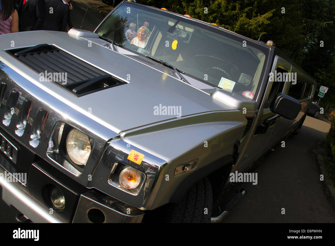 Silver Humvee limousine car Stock Photo