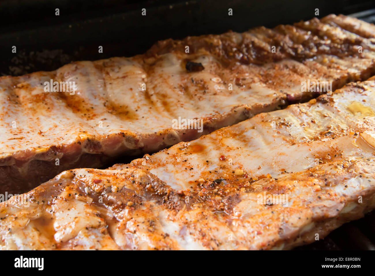 Barbeque ribs cooking on the hot outdoor grill Stock Photo Alamy
