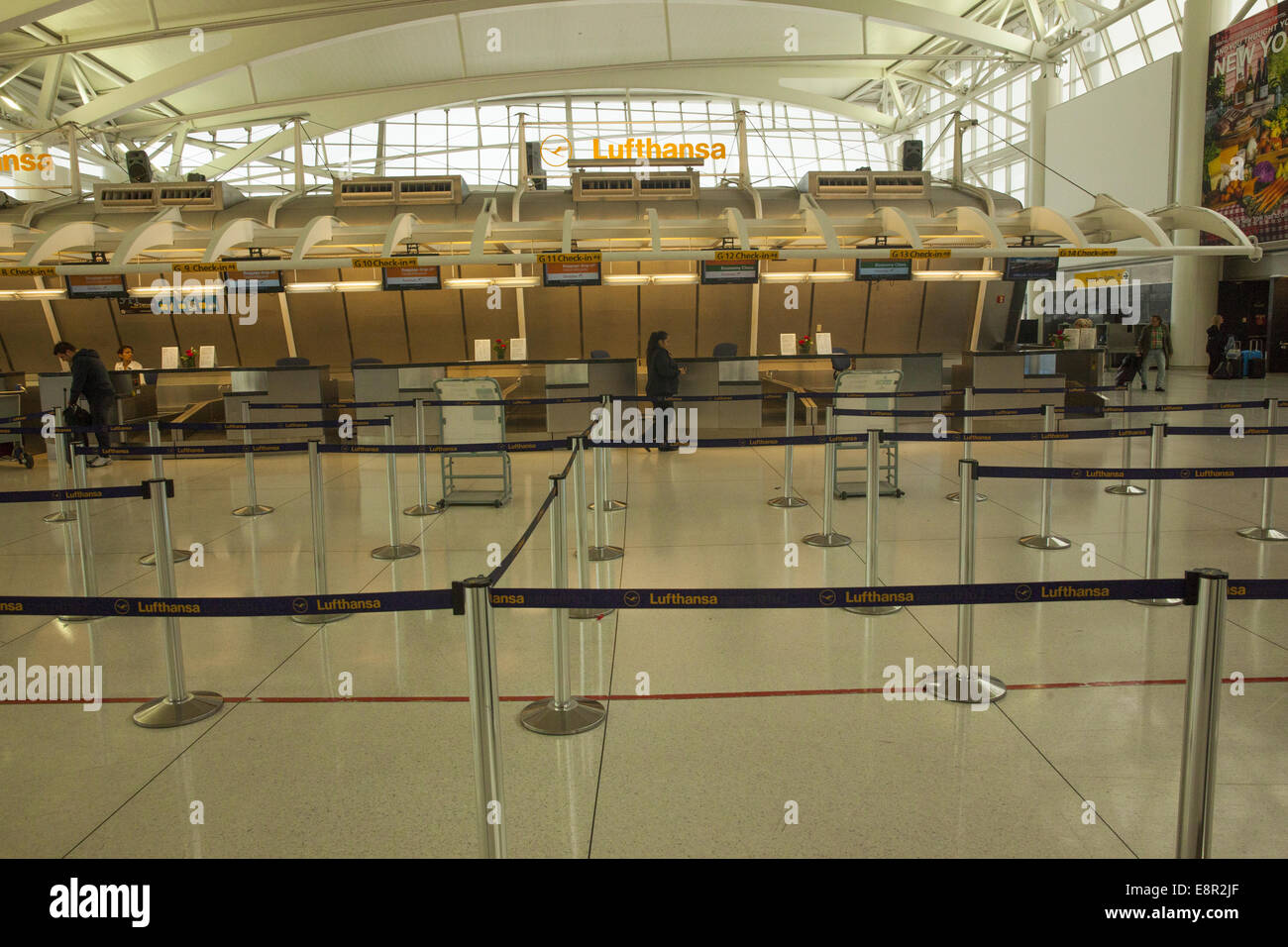 Empty Lufthansa check-in ticket counter area at JFK Airport in New York City. Stock Photo
