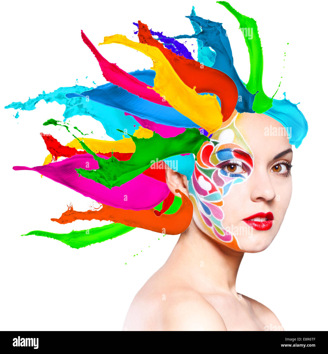 Portrait of a beautiful young model with bright make up and colored ...