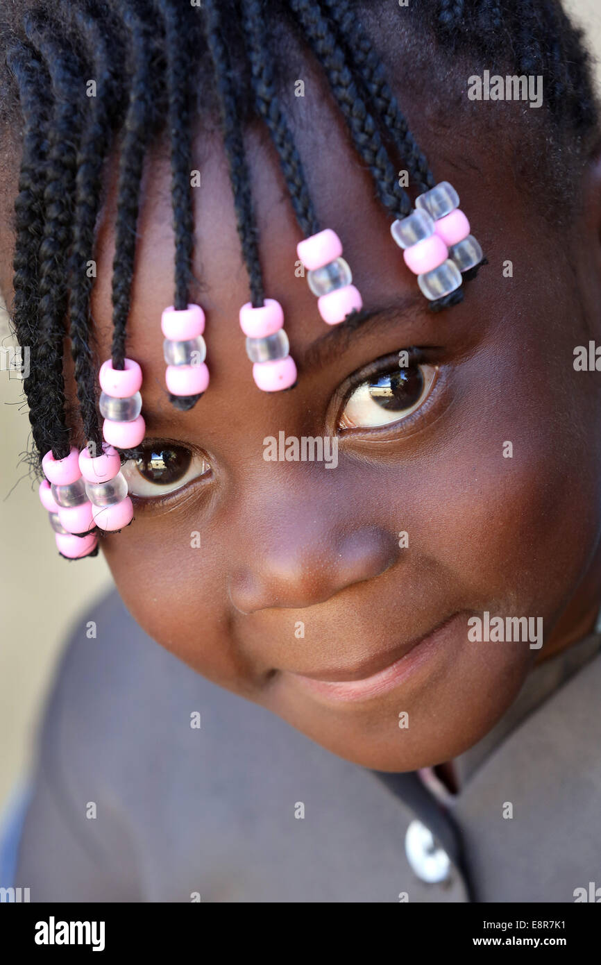 4 Years Old Girl With Dreadlocks Looking At Camera Lusaka Zambia