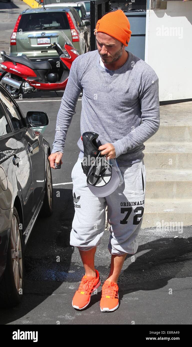 David Beckham seen leaving the gym in Beverly Hills wearing bright orange trainers and beanie hat Featuring David Beckham Where Los Angeles California United States When 10 Apr 2014 Stock Photo Alamy