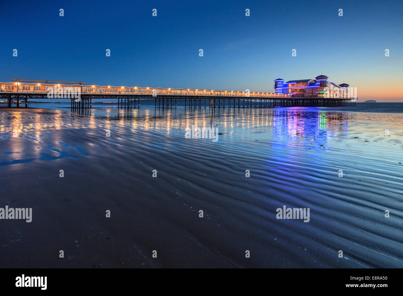 The rebuilt Grand Pier at Weston-Super-Mare captured about 45 minutes after sunset. Stock Photo