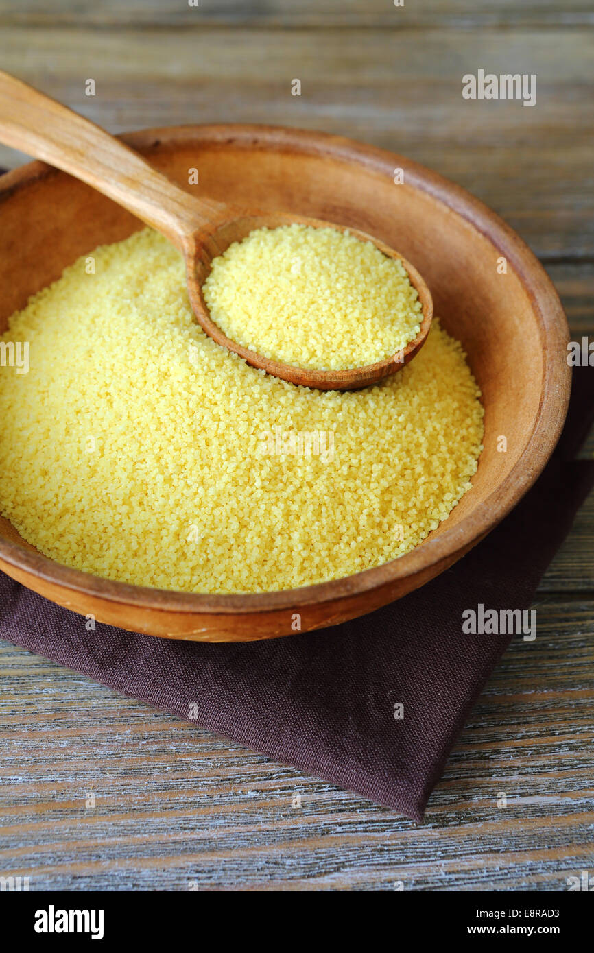 Arabic couscous in a clay bowl on boards, food close up Stock Photo Alamy