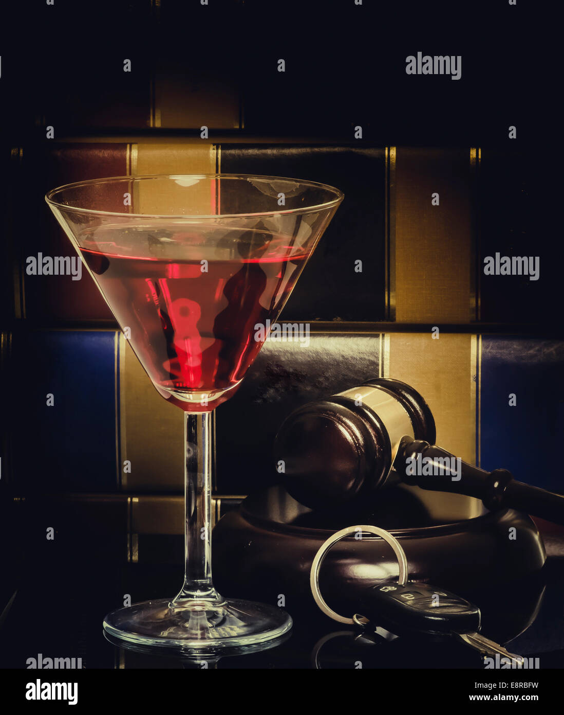 Dui, drink driving, law legal concept image..... Books, wine glass and car keys. Stock Photo