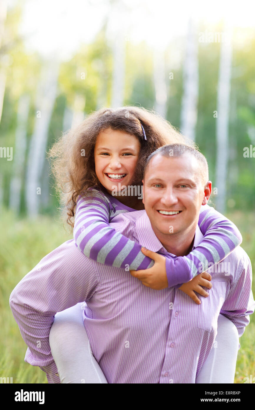 Happy young father with daughter in autumn day Stock Photo - Alamy
