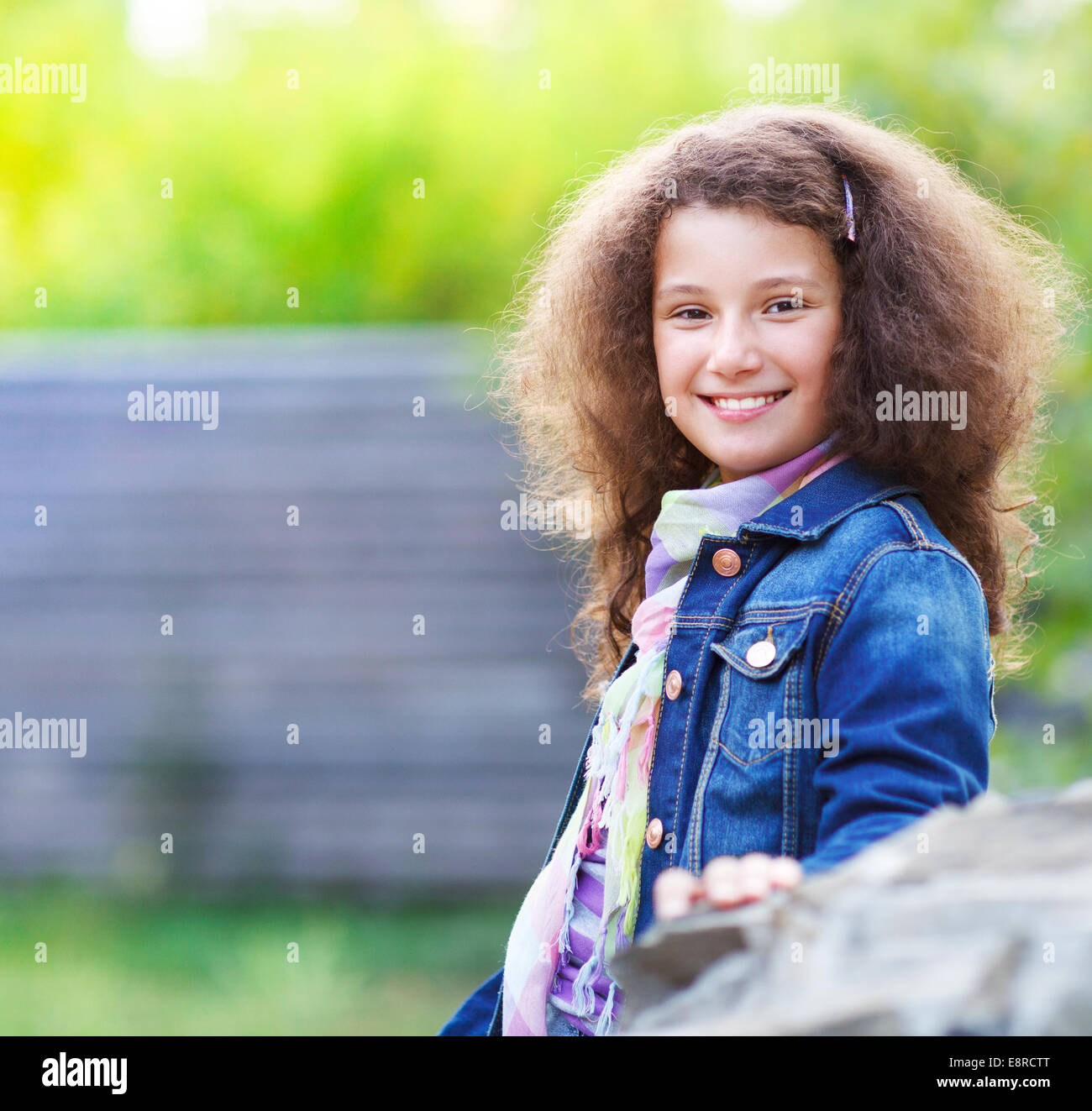 Portrait of the smiling happy little girl outdoor Stock Photo - Alamy