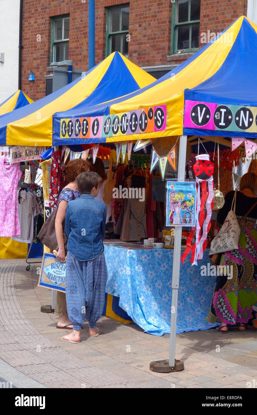 Shoppers at a Market Stall, Stourbridge Carnival part of the Black Country Festival, Lower High St, Stourbridge, West Mids, UK Stock Photo
