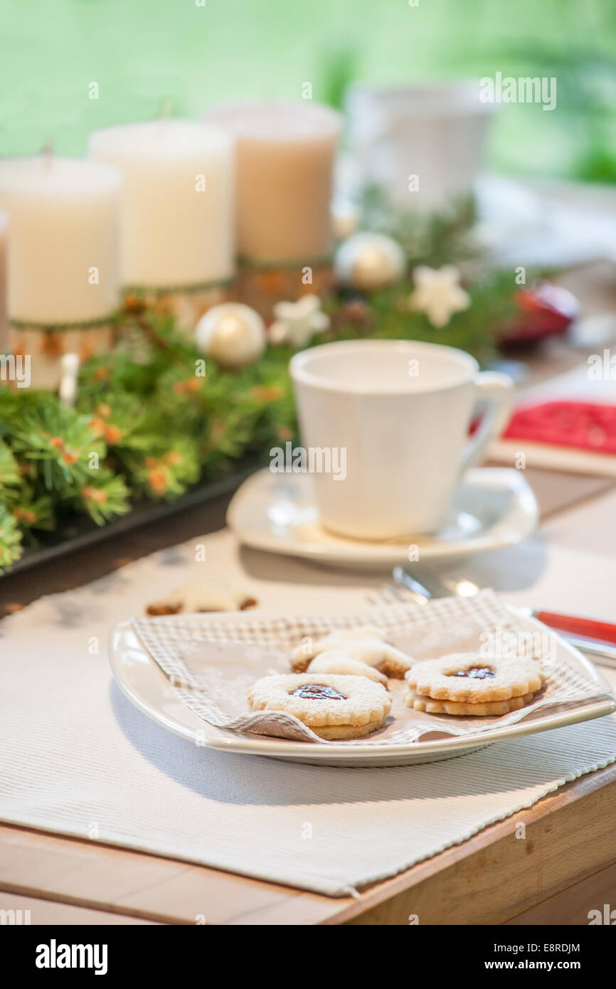Coffee table with Advent wreath and Christmas cookies Stock Photo