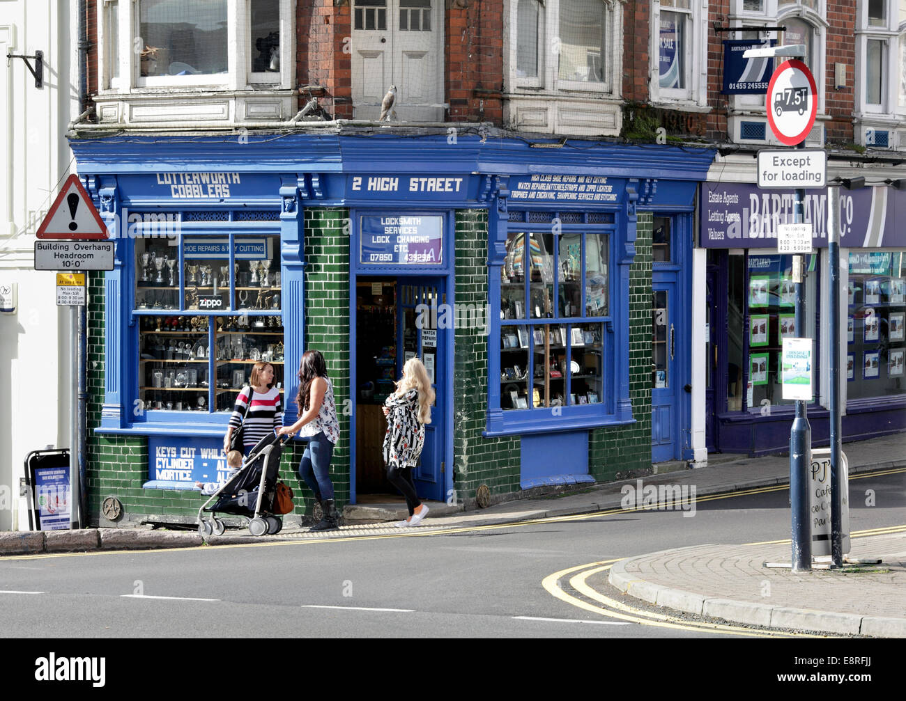 Traditional locksmith and cobblers shop, High Street, Lutterworth, Leicestershire. Stock Photo