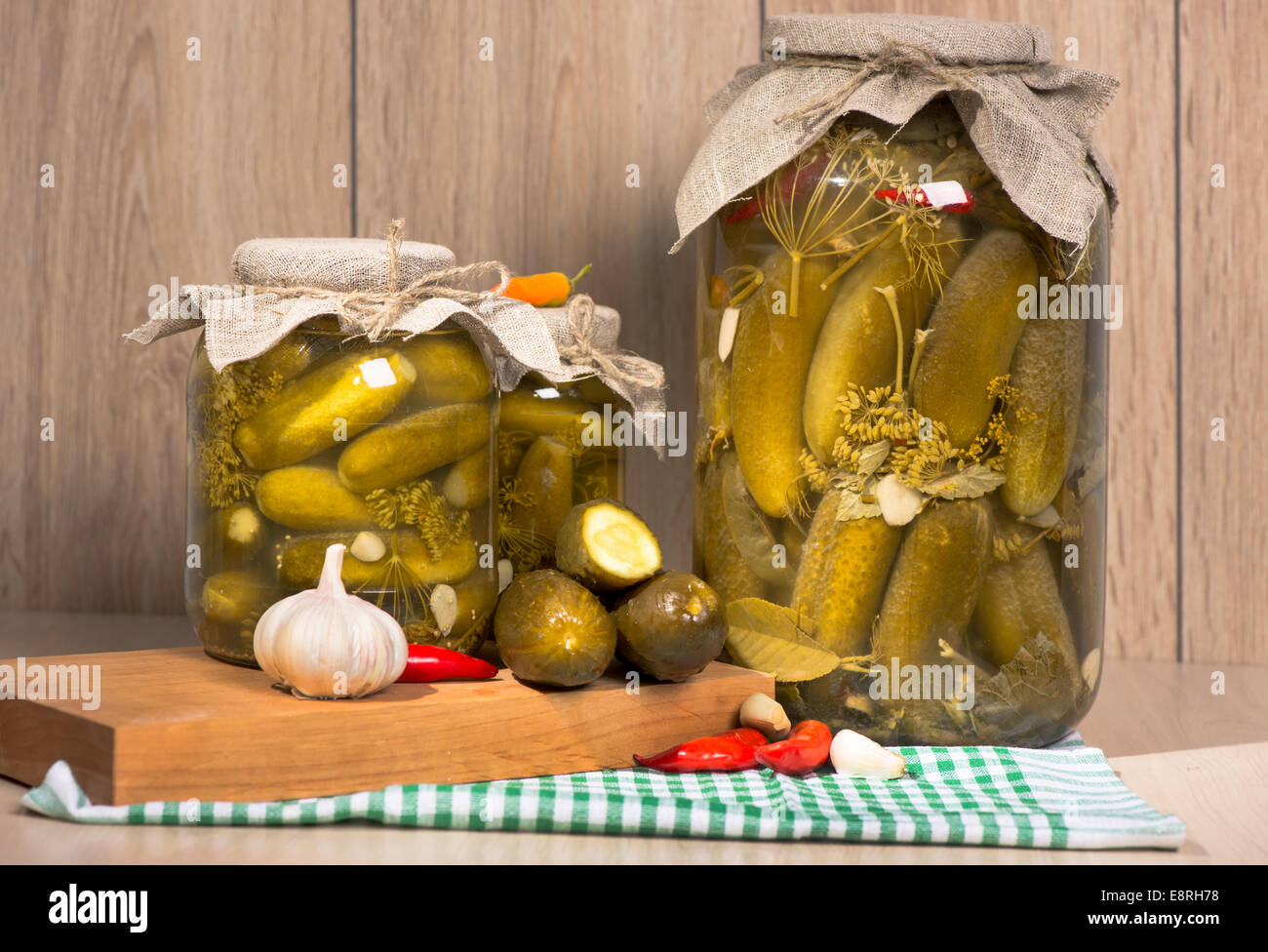 pickled gherkins in jars of home canning Stock Photo Alamy