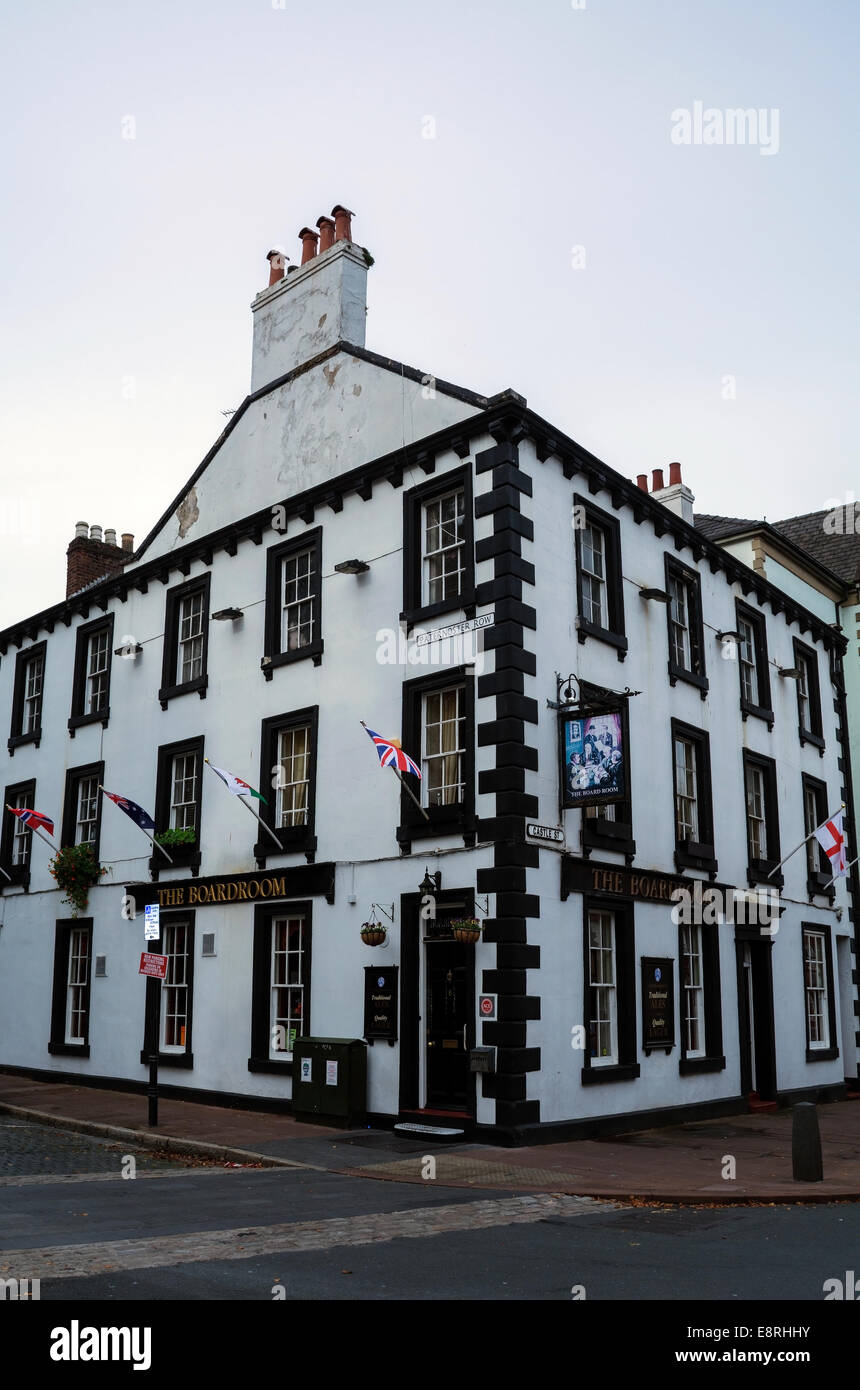 The striking black and white painted exterior of The Boardroom public house near the cathedral in Carlisle, Cumbria. Stock Photo