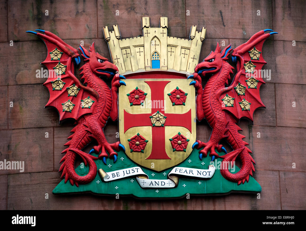 The coat of arms for the city of Carlisle in England is displayed outsie Tullie House Museum on the wall of the rotunda building Stock Photo