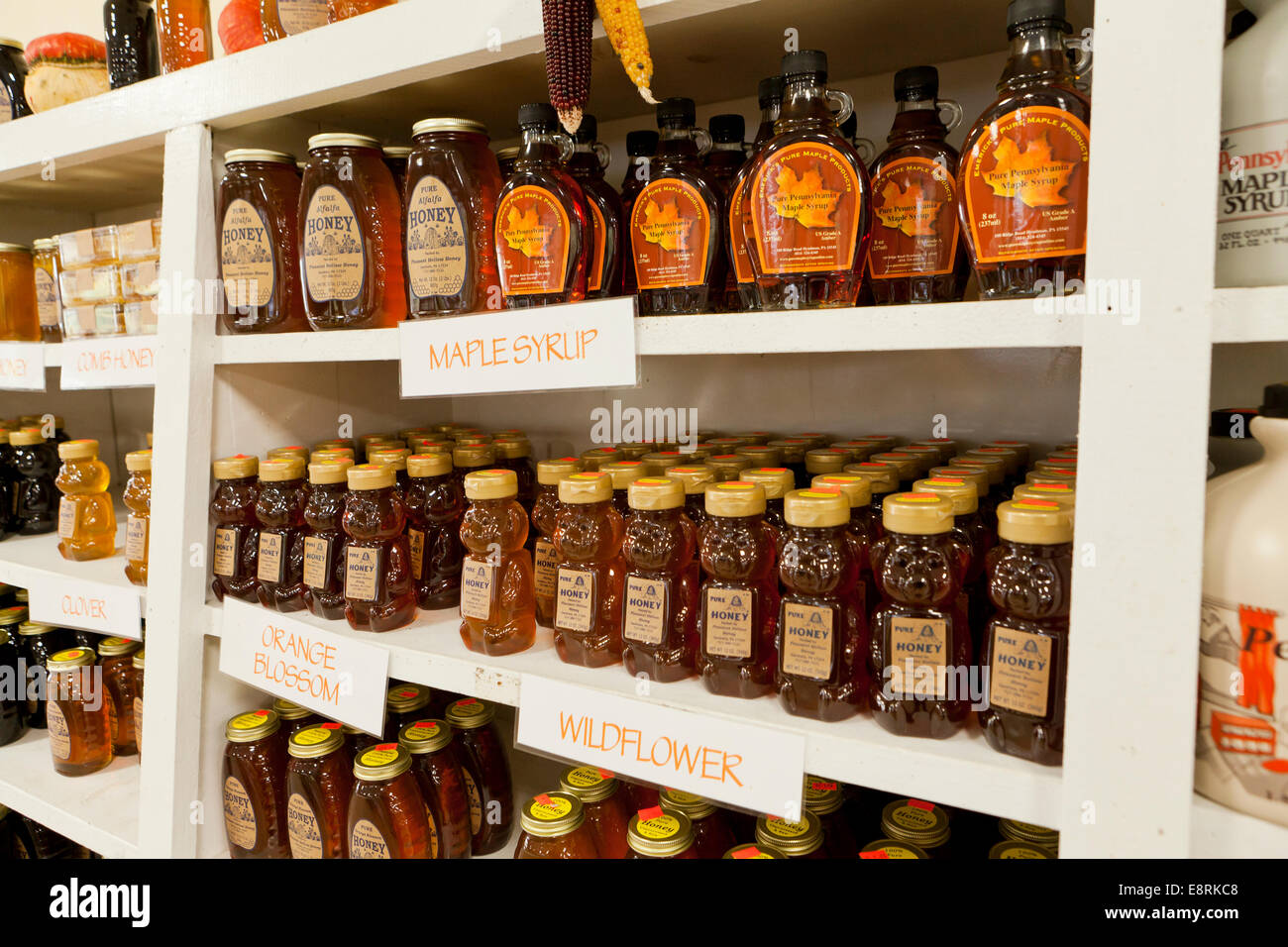 Maple syrup and honey at farmers market - Pennsylvania USA Stock Photo