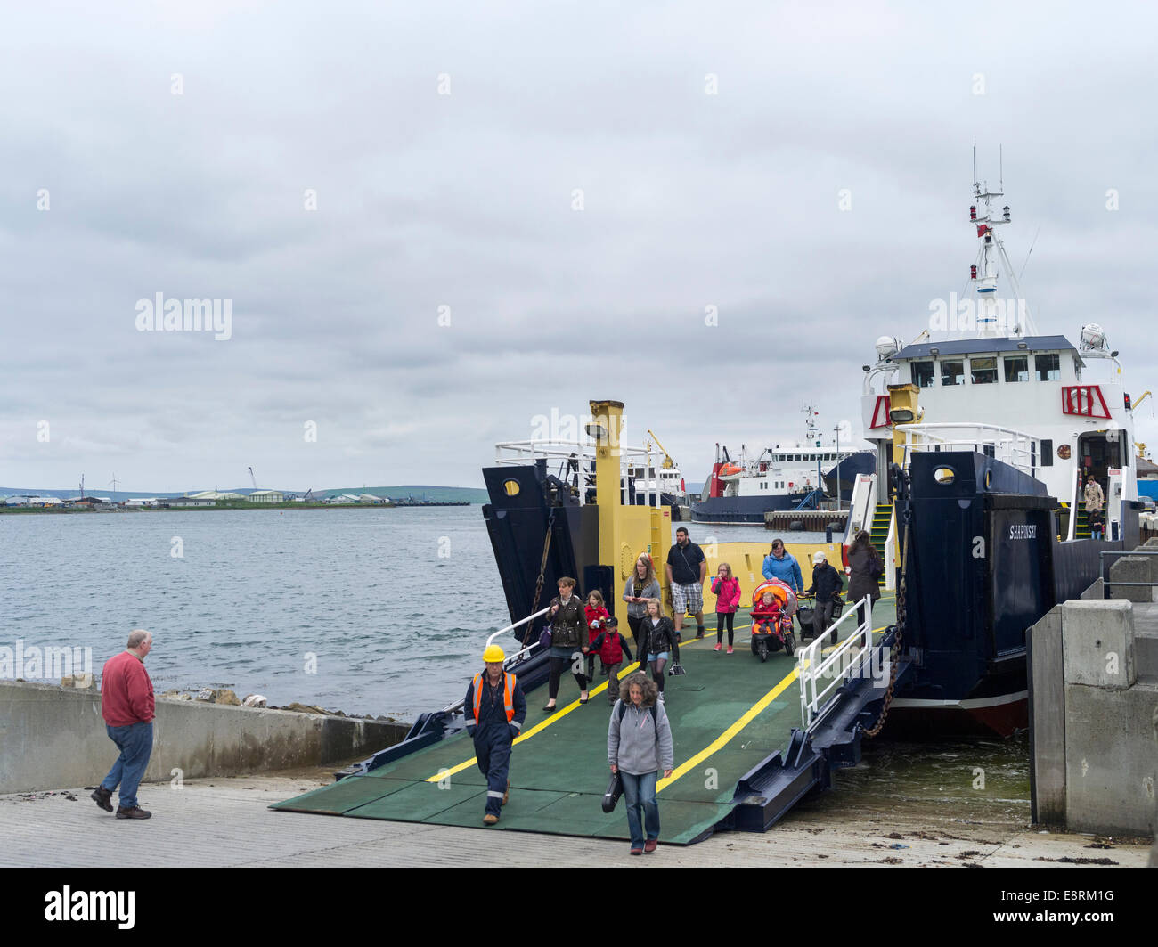 Traditional harbor near the old town waterfront, jetty for ferries to the smaller islands, Kirkwall, Orkney islands, Scotland. Stock Photo