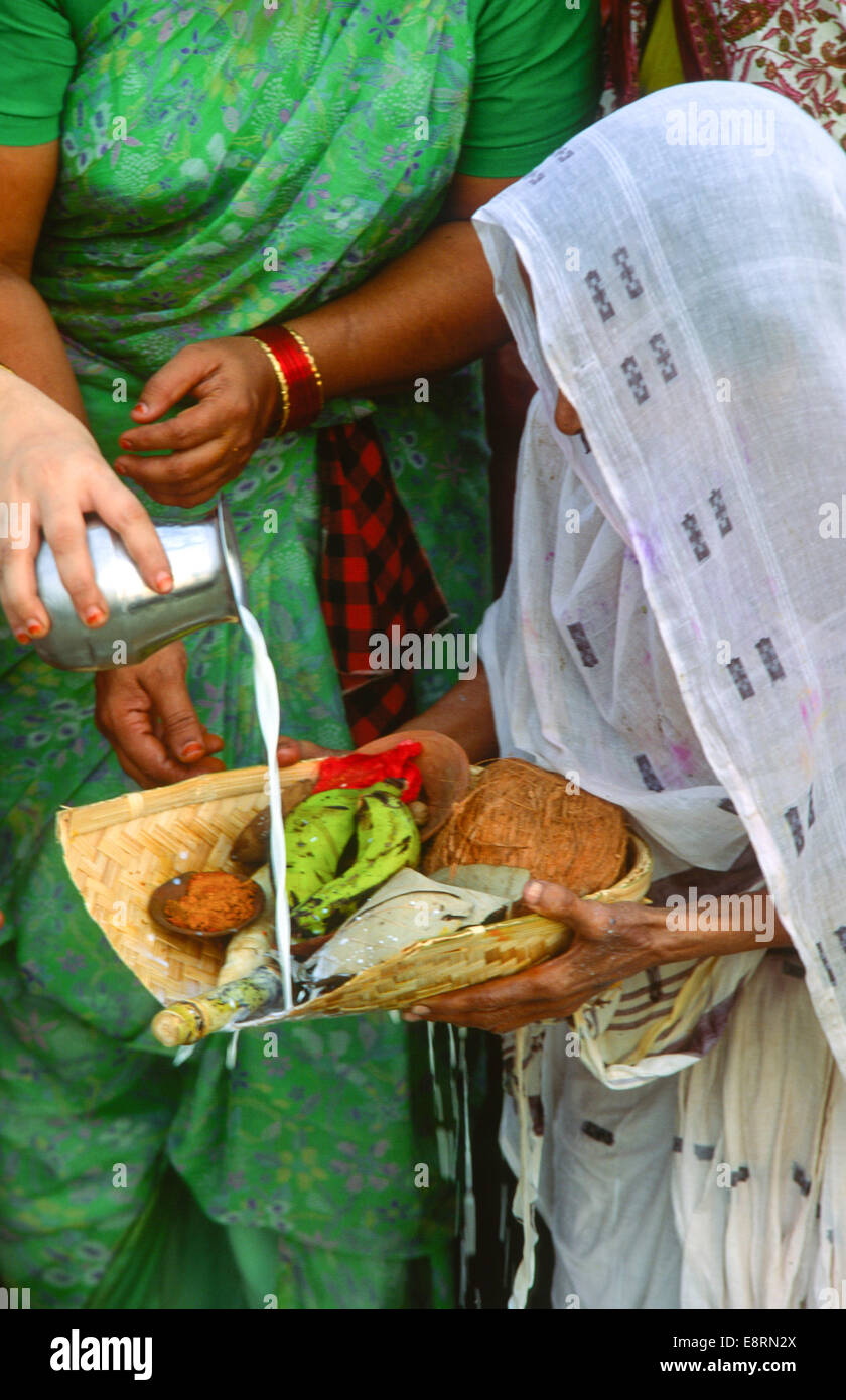 ceremony with fruit offerings in varanasi india Stock Photo