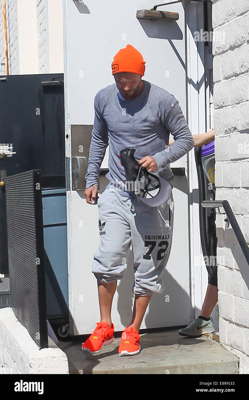 David Beckham leaves SoulCycle gym in Beverly Hills wearing bright