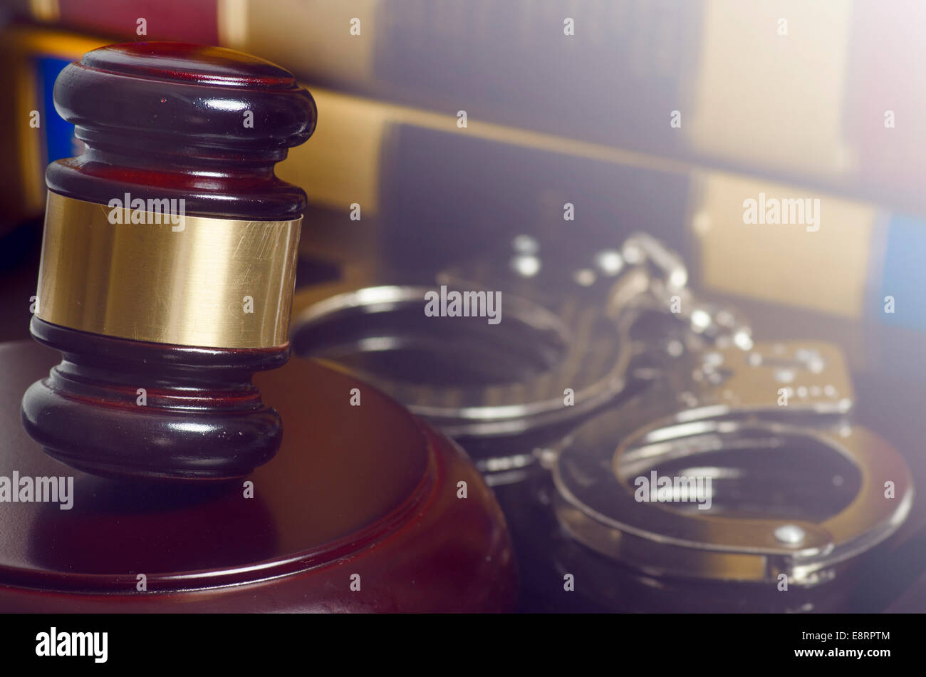 Legal law concept image.  Handcuffs gavel and law books Stock Photo