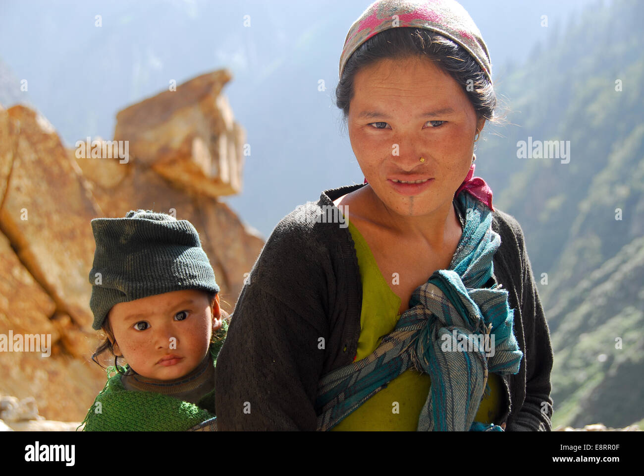 Indian woman carrying baby on hi-res stock photography and images - Alamy