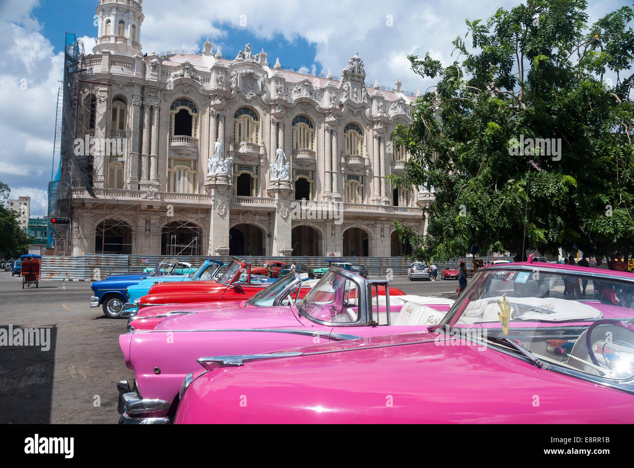 Vintage old American 1950's cars lined up for hire as taxis and tour vehicles on the Prado in central Havana Cuba Stock Photo