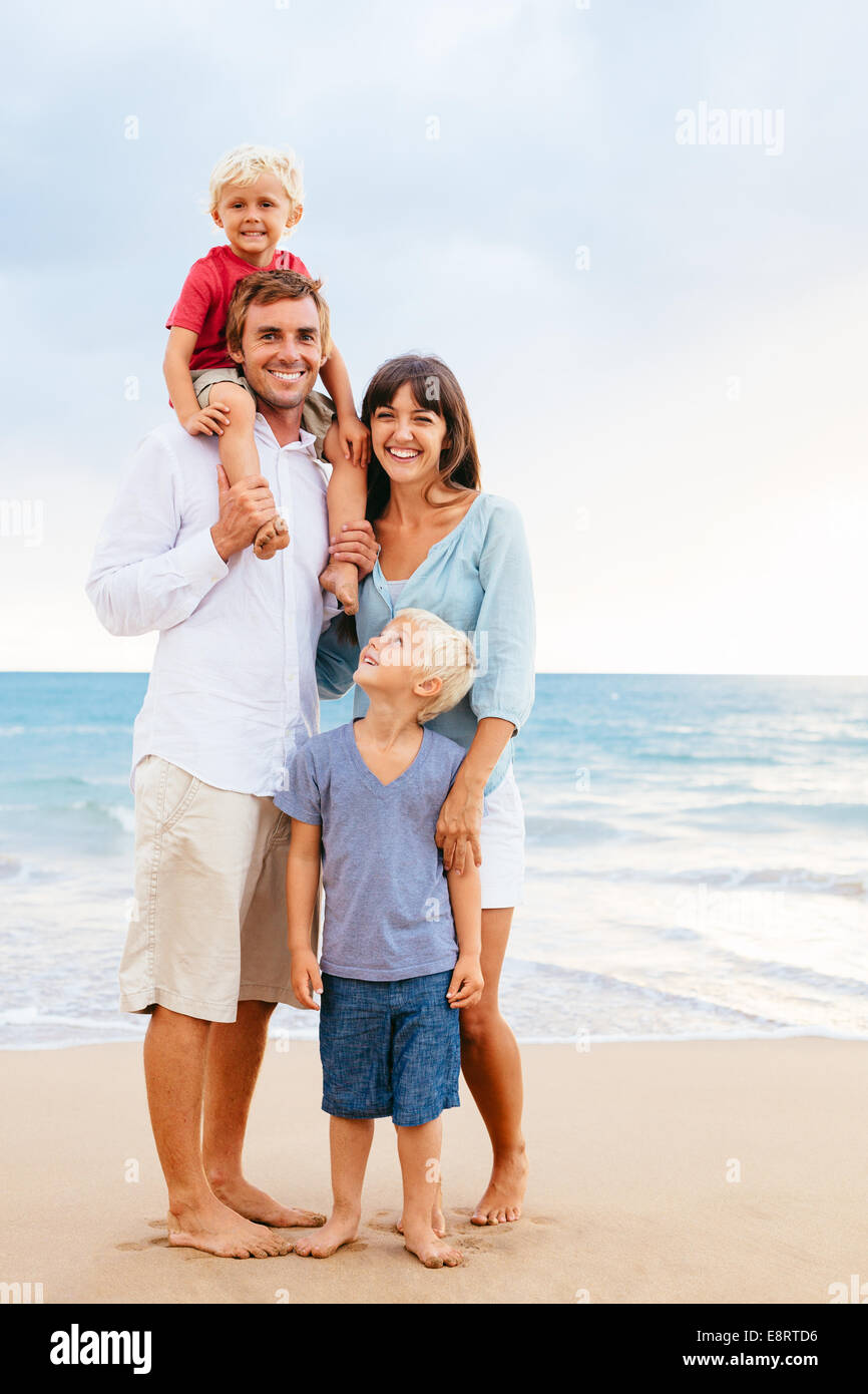 Happy Young Family Stock Photo - Alamy