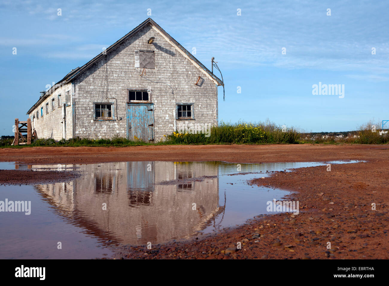 Old building in North Rustico Harbour - North Rustico, Prince Edward Island, Canada Stock Photo