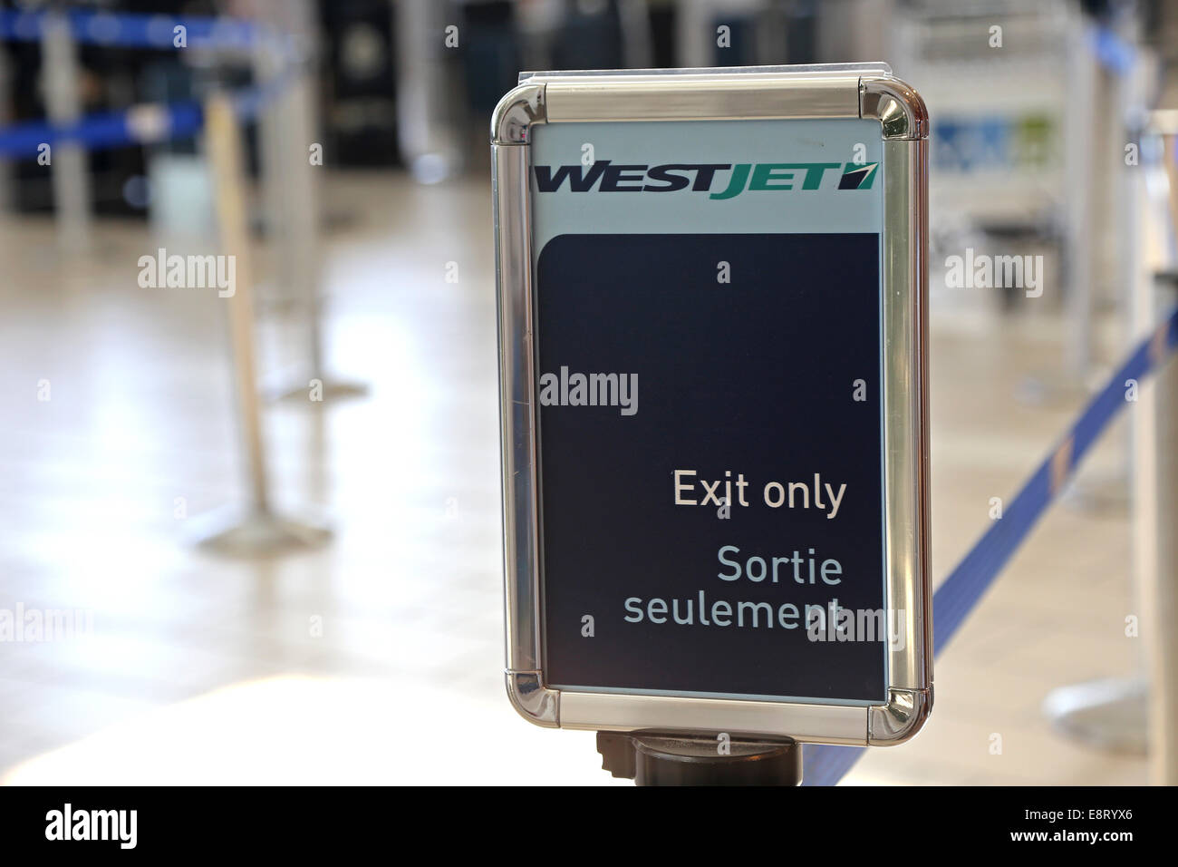 Westjet exit only in an airport Stock Photo